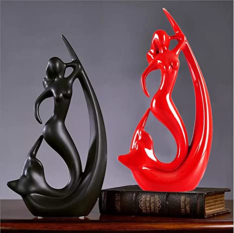 Black and Red Fish Angle Statue displaying modern abstract design on a white background.