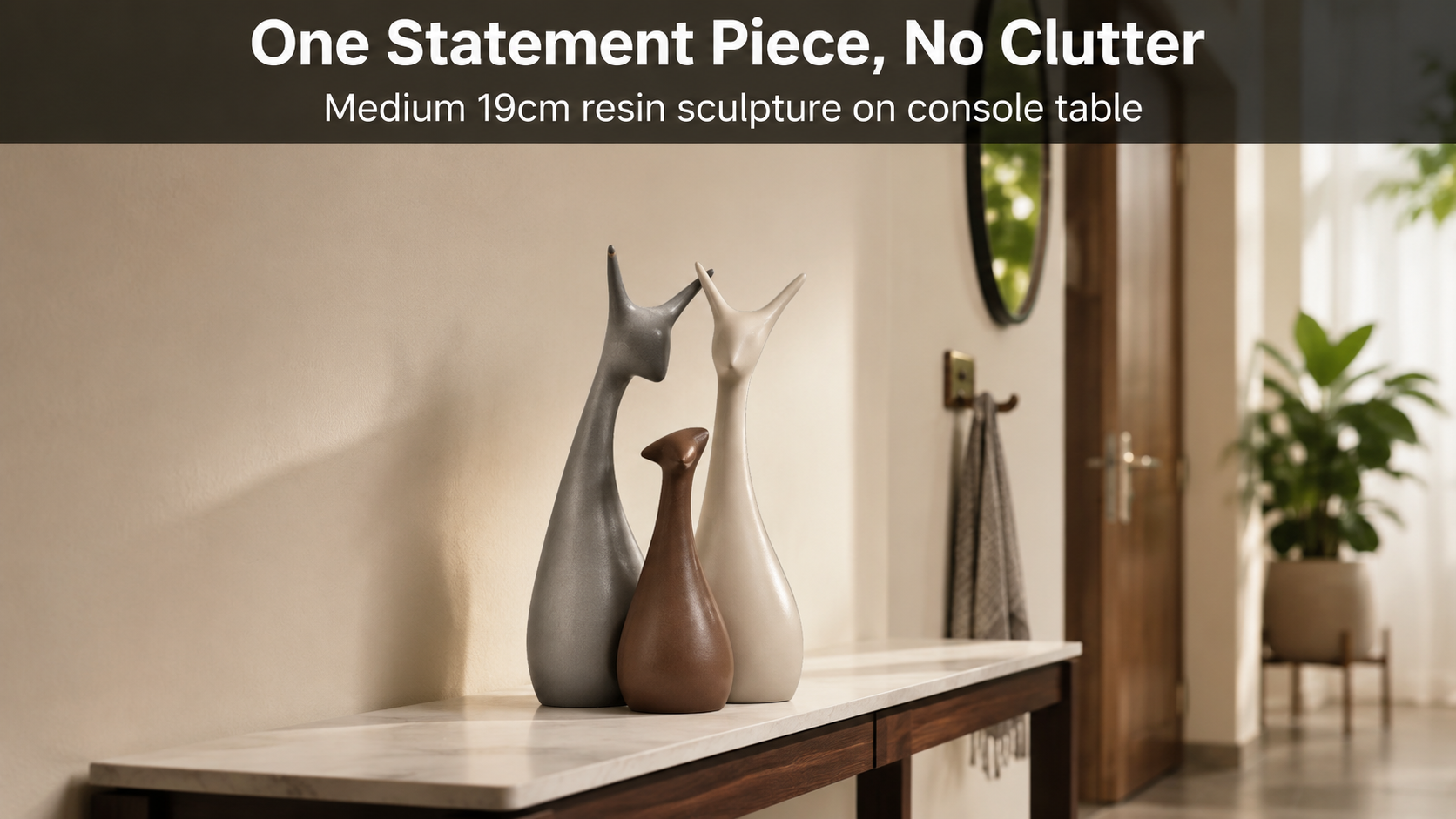 resin modern home décor sculpture on a console table