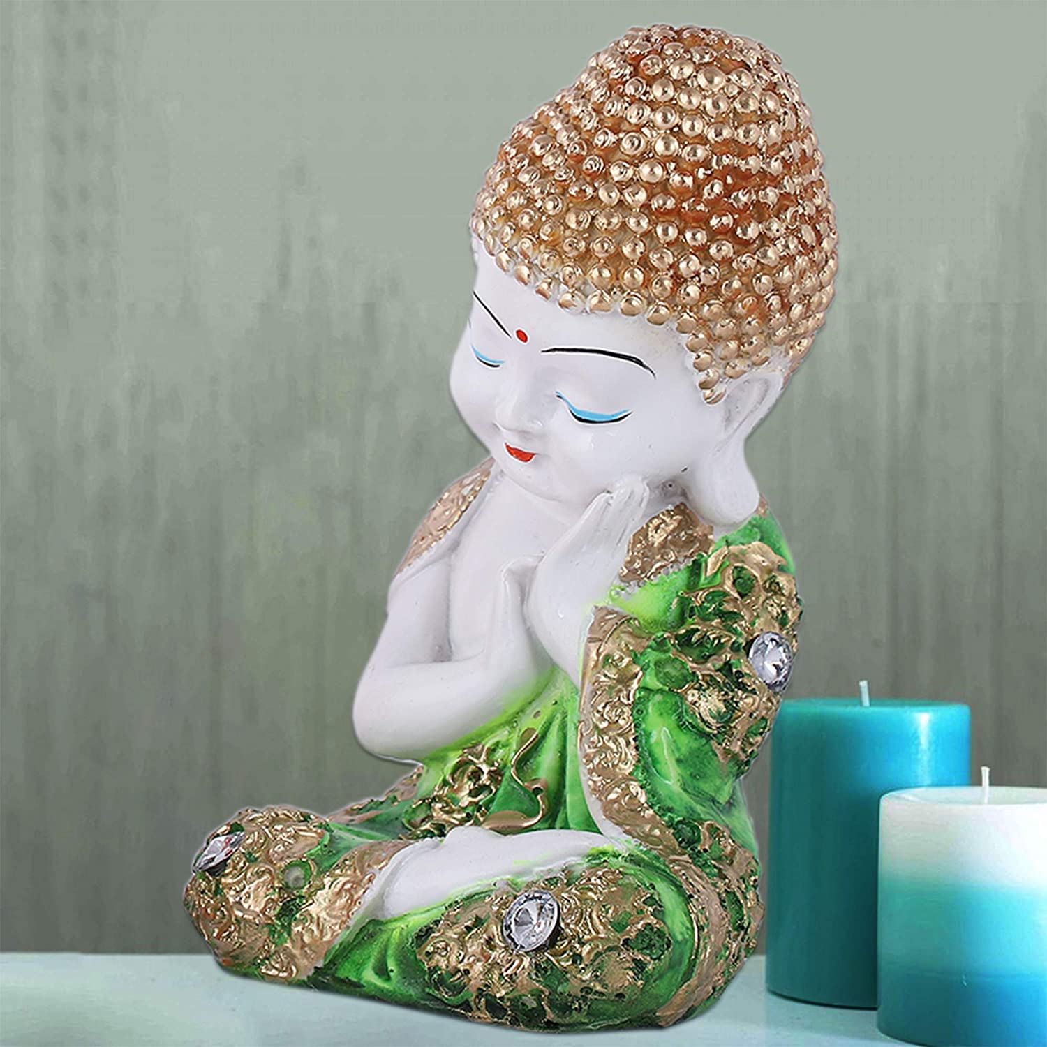 Green Baby Buddha Statue in meditation pose with vibrant green robe for kitchen display.