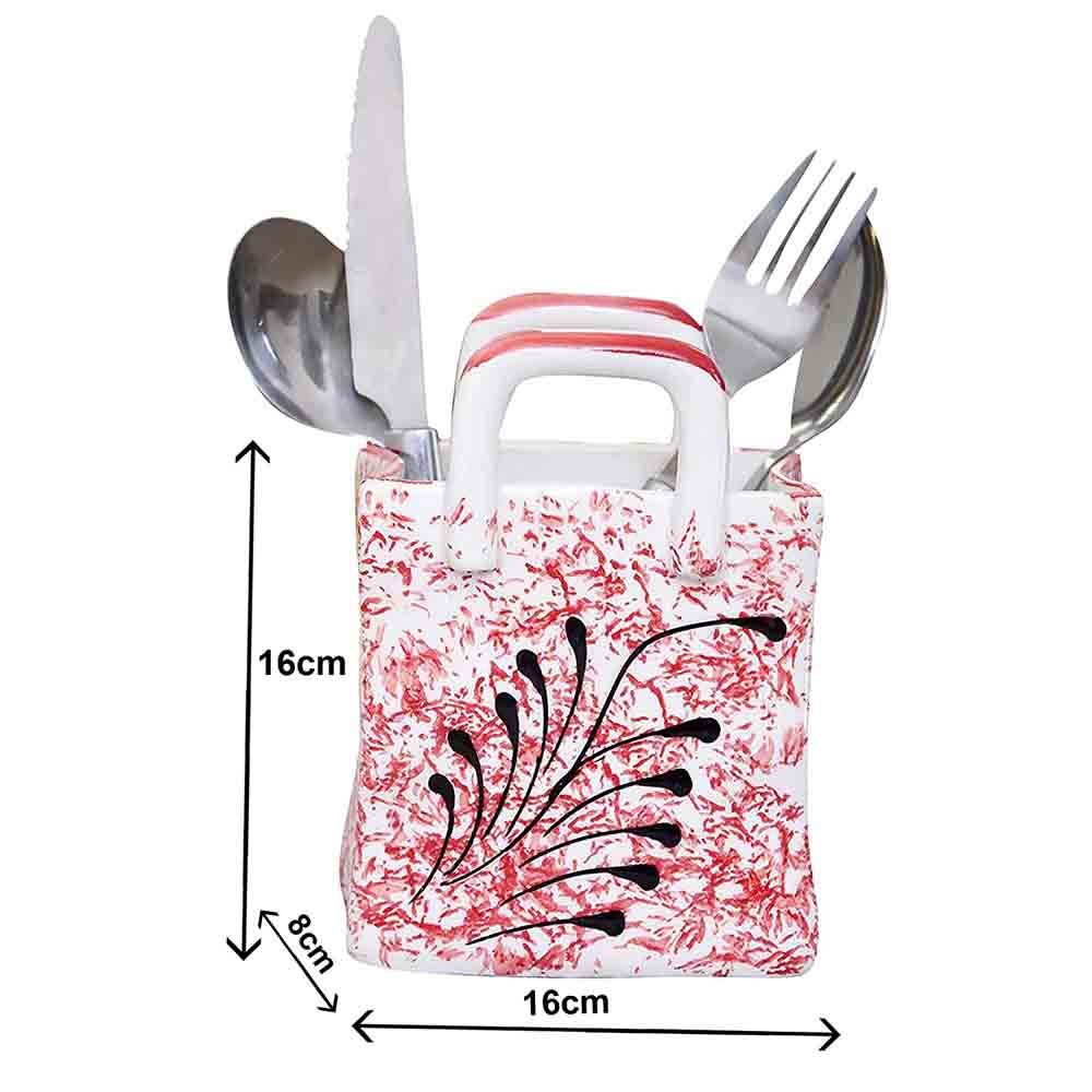 White and Brown Ceramic Cutlery Holder placed on a kitchen counter with various spoons and forks.