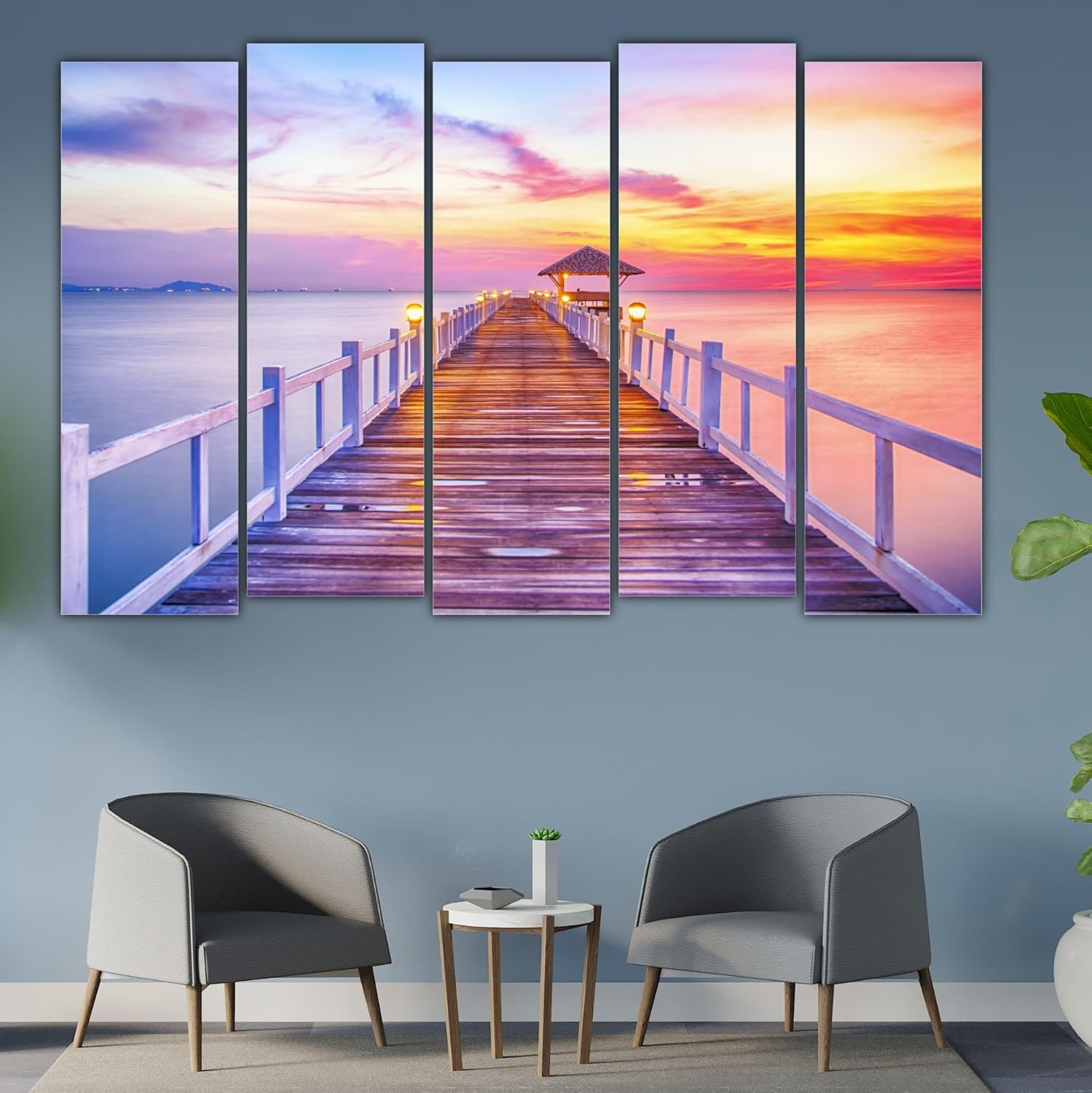 Multi-panel framed sea nature wall art titled Seas the Day hung over a living room sofa
