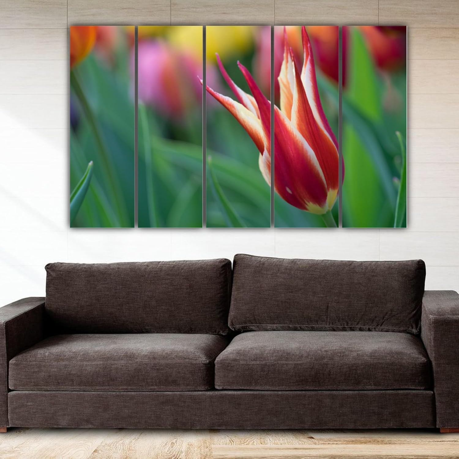 Five-panel floral photography framed Wall Art hanging above a sofa bringing playful petals to the space