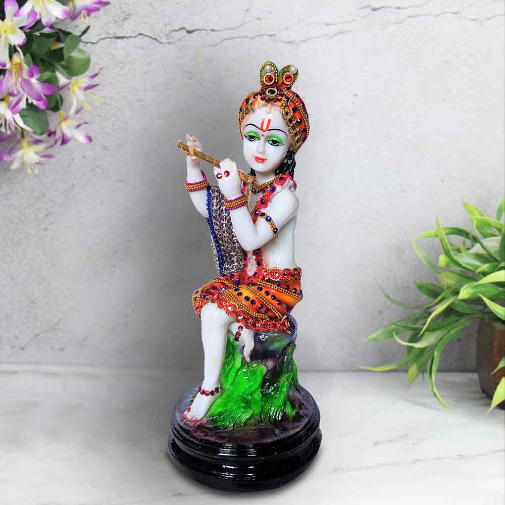 top-online-decoration-for-sitting-krishna-idol-playing-flute-for-janmashtami.jpg