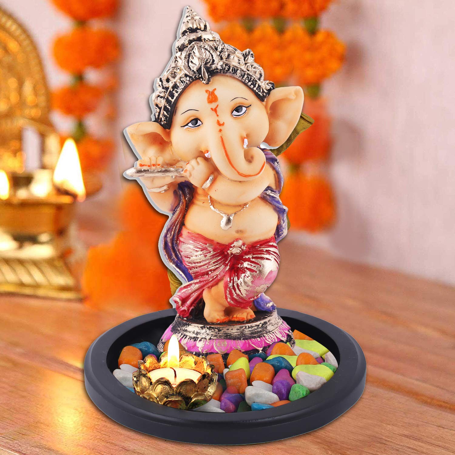 Beige and Silver Ganesh Idol in Krishna Pose for Ganesh Chaturthi Deocration