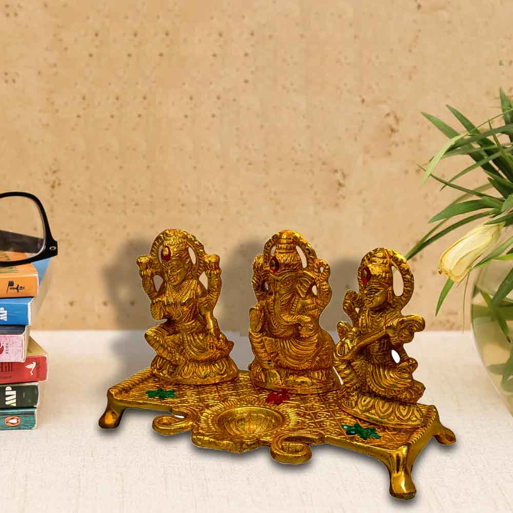 top-online-decoration-for-ganesh-chaturthi-with-small-metal-ganesh-lakshmi-saraswati-idol.jpg