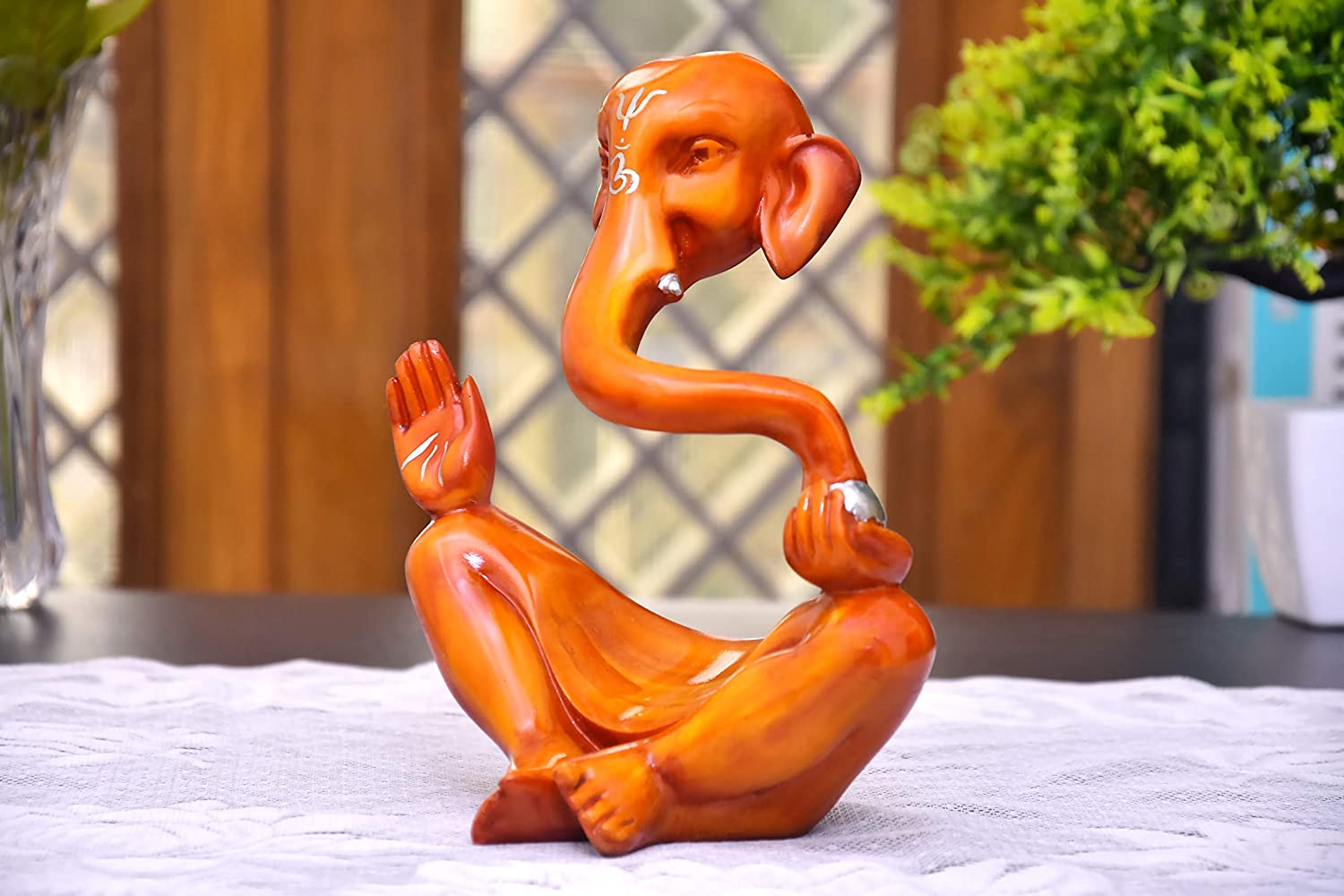 top-orange-modern-design-ganesh-idol-for-ganesh-chavithi-in-india.jpg