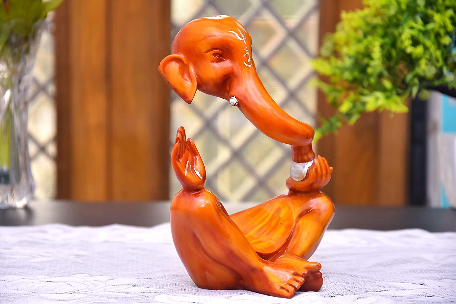 top-modern-design-orange-ganesh-idol-for-vinayagar-chaturthi-available-online.jpg