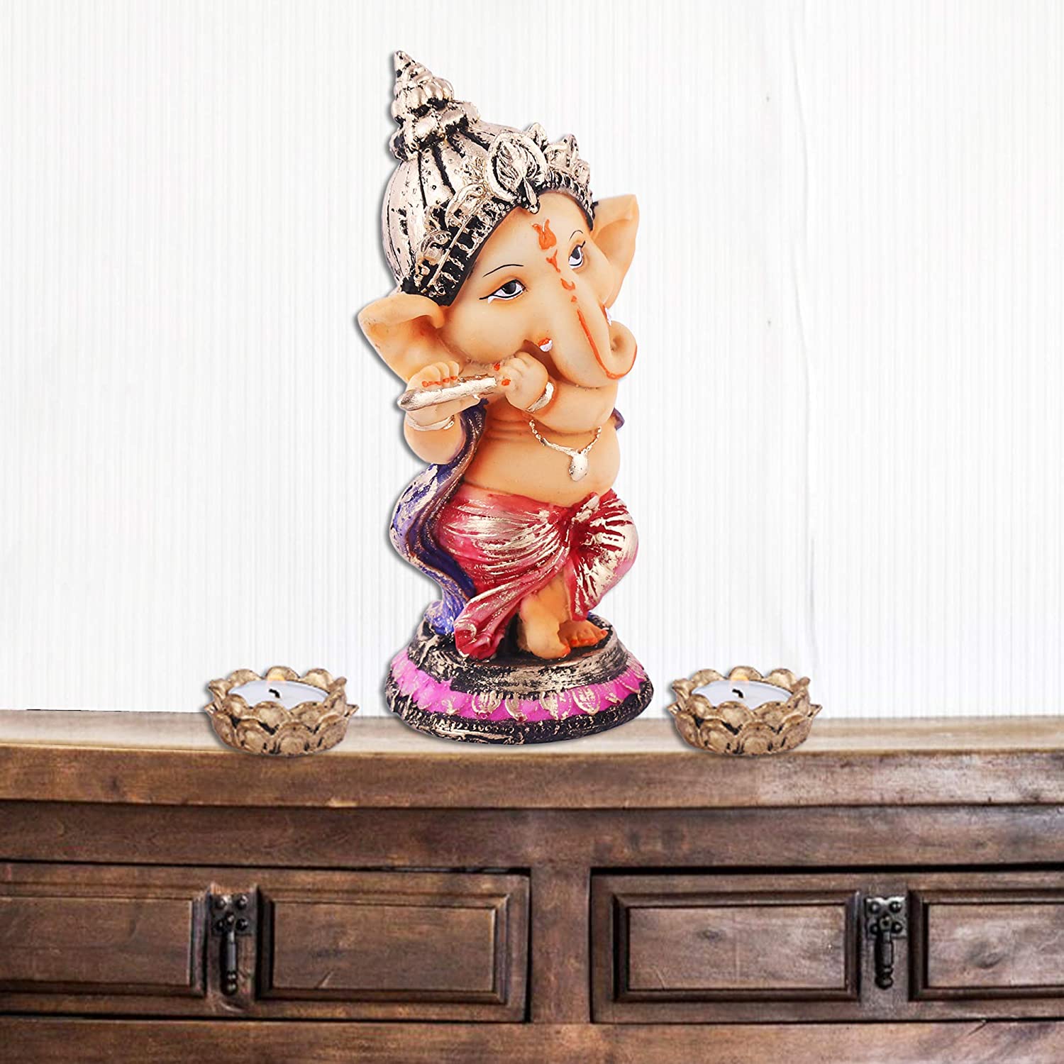 top-six-inch-beige-ganesh-idol-playing-flute-for-vinayagar-chaturthi-celebration-in-india.jpg
