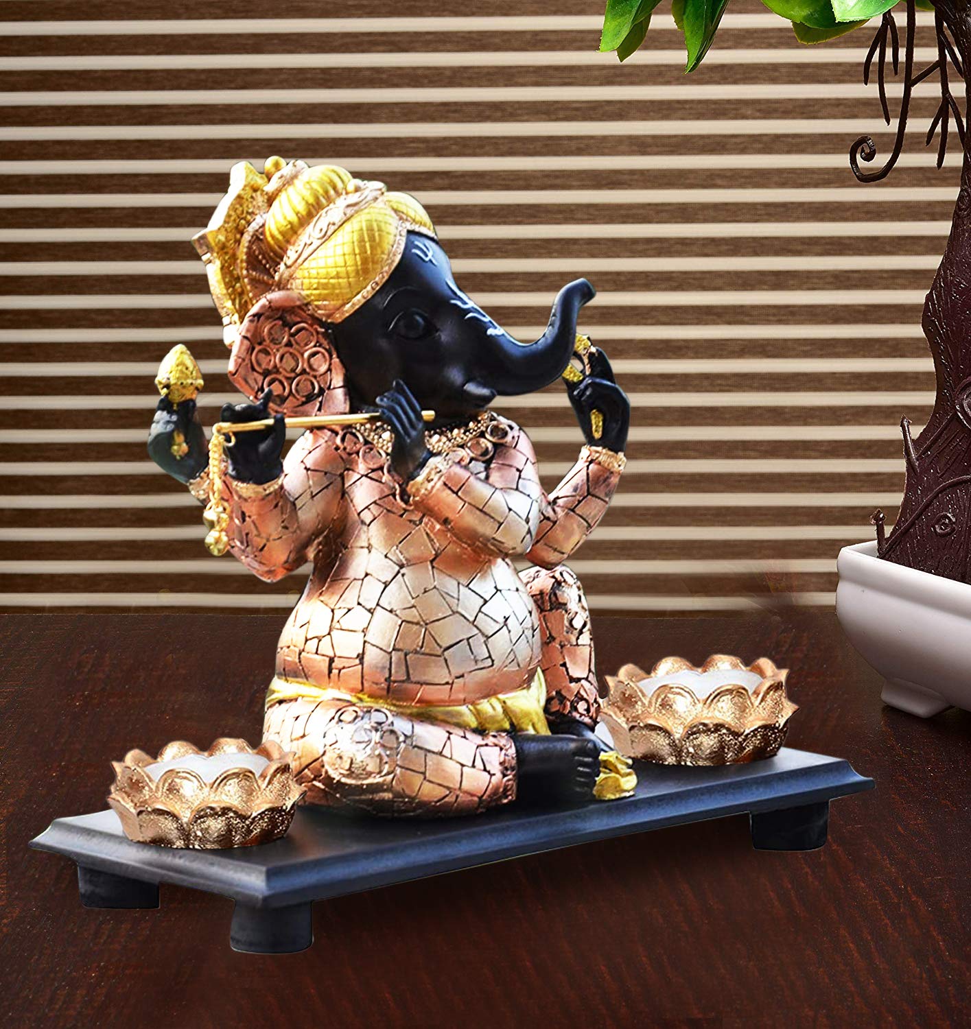 top-black-and-golden-ganesh-idol-playing-flute-for-vinayagar-chaturthi-in-india.jpg