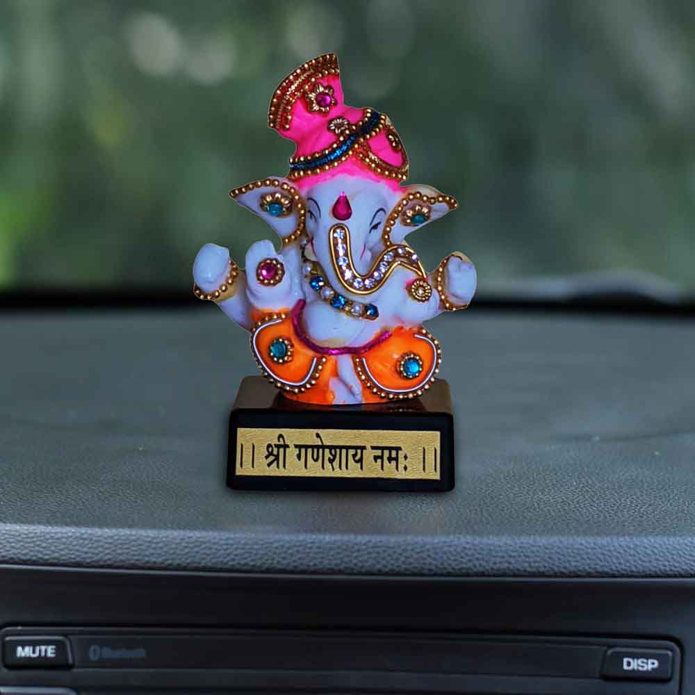 top-vinayagar-chaturthi-decoration-with-a-white-ganesh-idol-wearing-dhoti-in-india.jpg