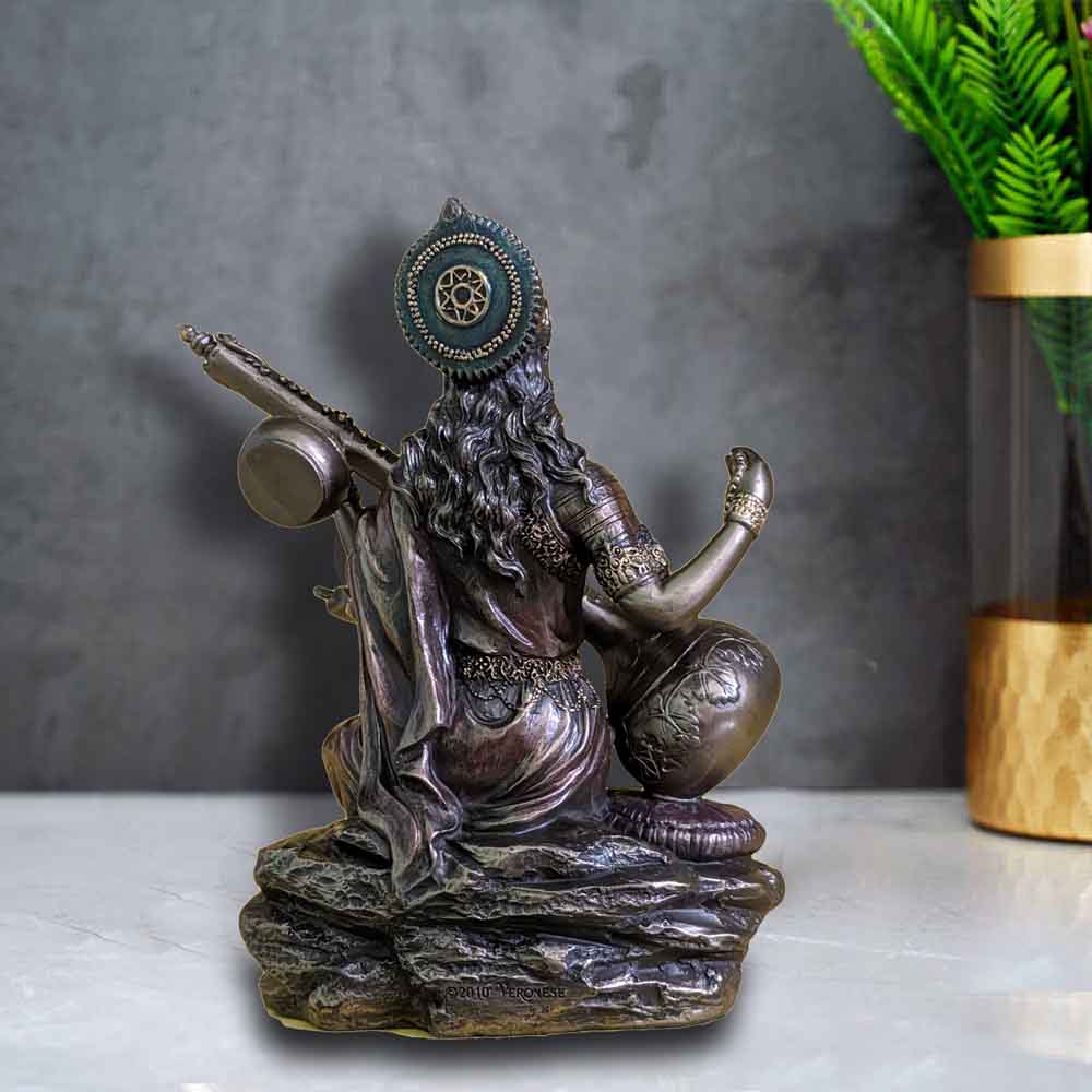 top-shopping-decoration-for-vinayagar-chaturthi-with-a-six-inch-cold-cast-saraswati-idol.jpg