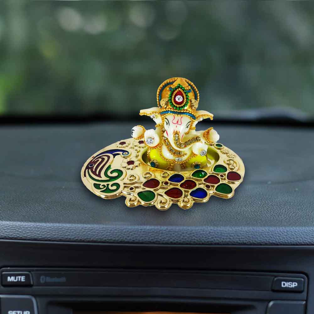 top-white-ganesh-idol-on-a-golden-tray-for-ganpati-festival-in-india.jpg
