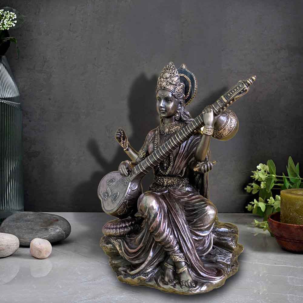 top-online-six-inch-cold-cast-saraswati-idol-for-ganpati-festival.jpg