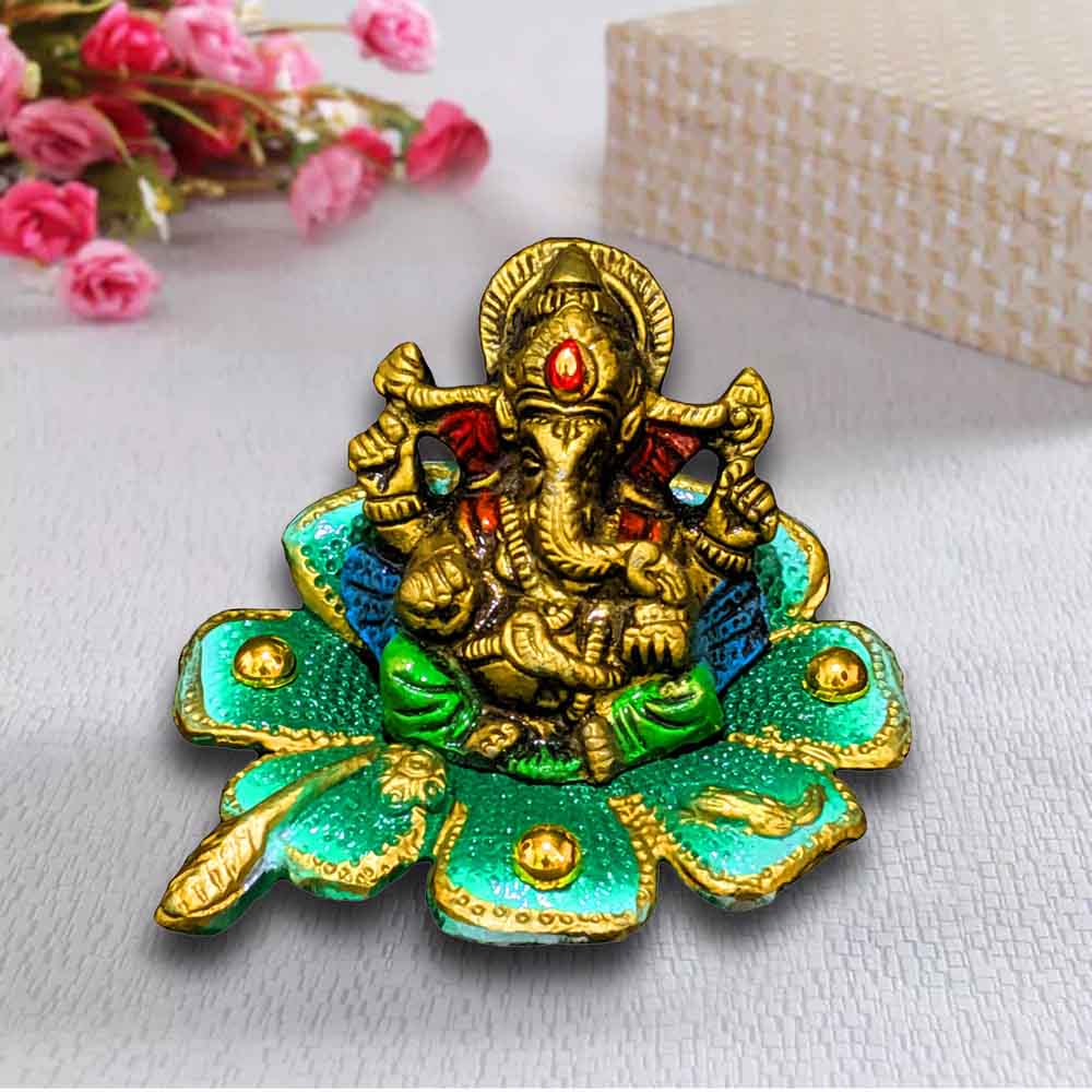 top-small-golden-ganesh-idol-on-a-flower-for-ganesha-sankashti-online.jpg