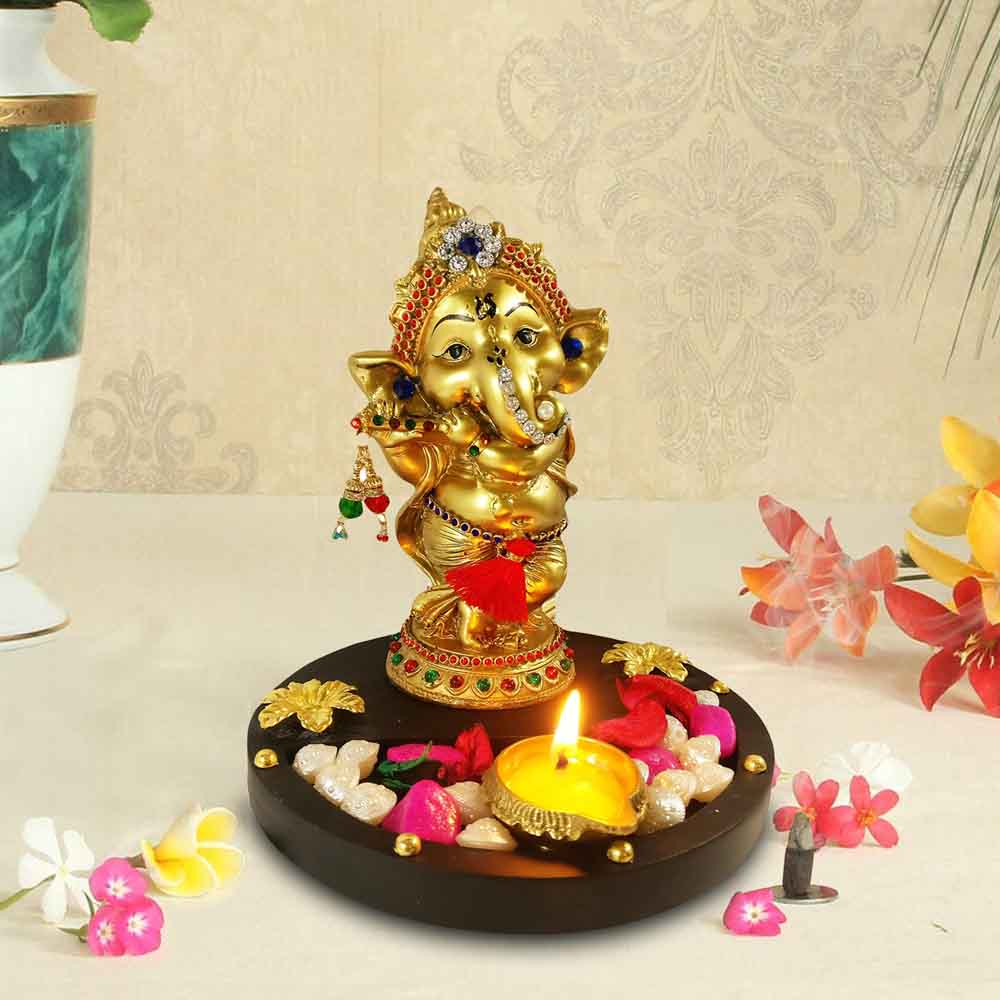 top-ganesh-idol-with-brass-diya-for-diwali-home-shopping.jpg