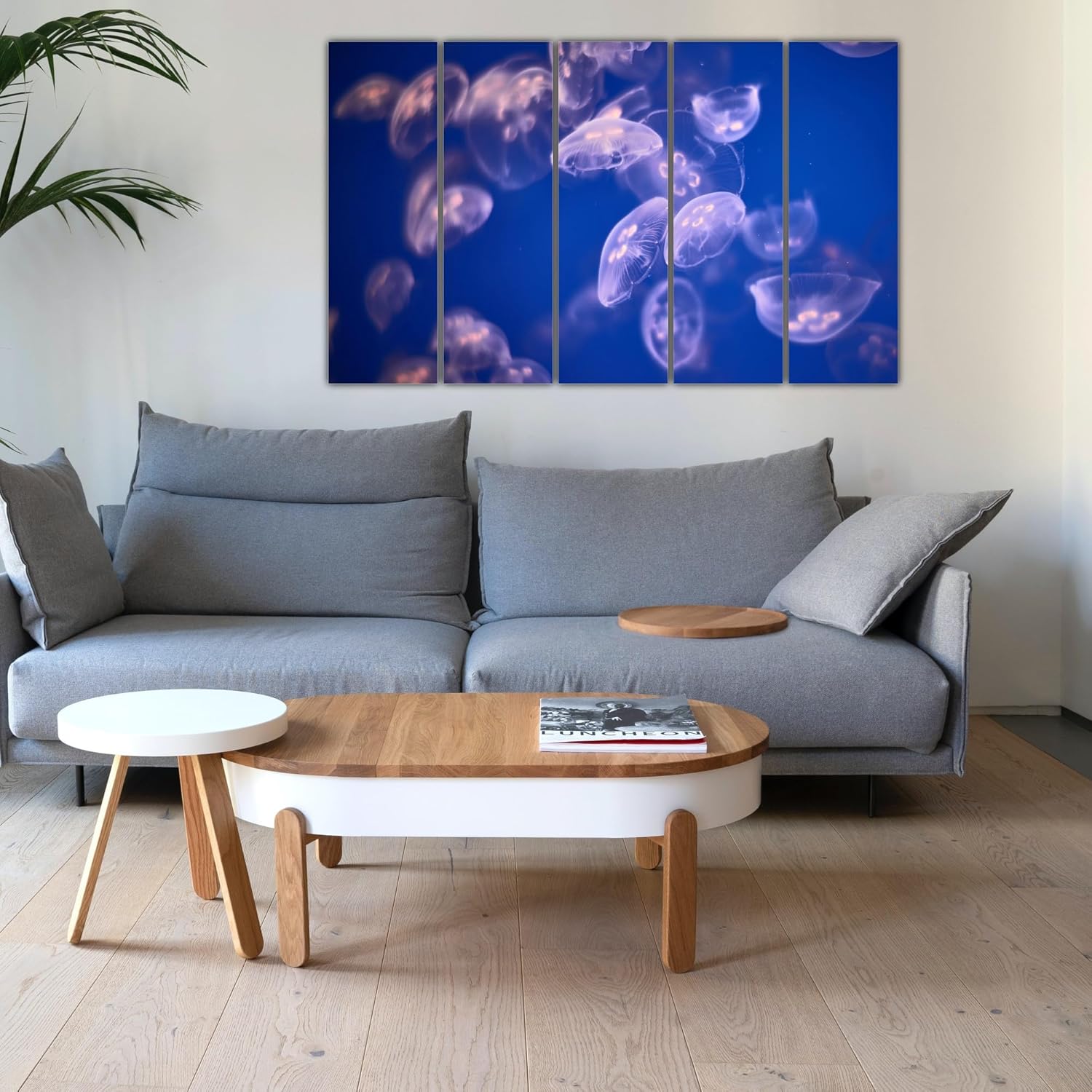 Close-up of one framed panel from the Jelly-tastic Multi-Frame Jellyfish Abstract Wall Art hung on a living room wall