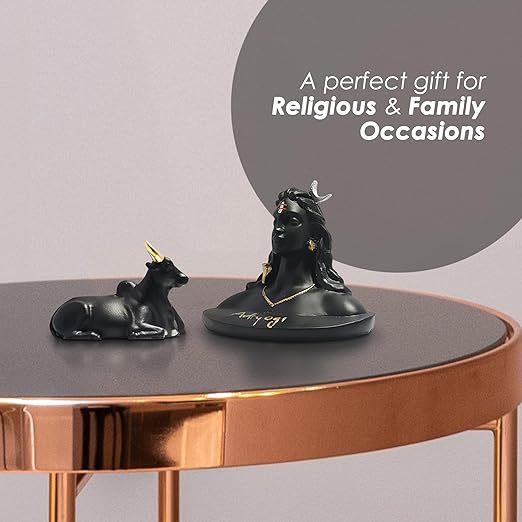Adiyogi and Nandi statue in elegant black and golden colors, showcasing intricate detailing and placed against a kitchen backdrop.