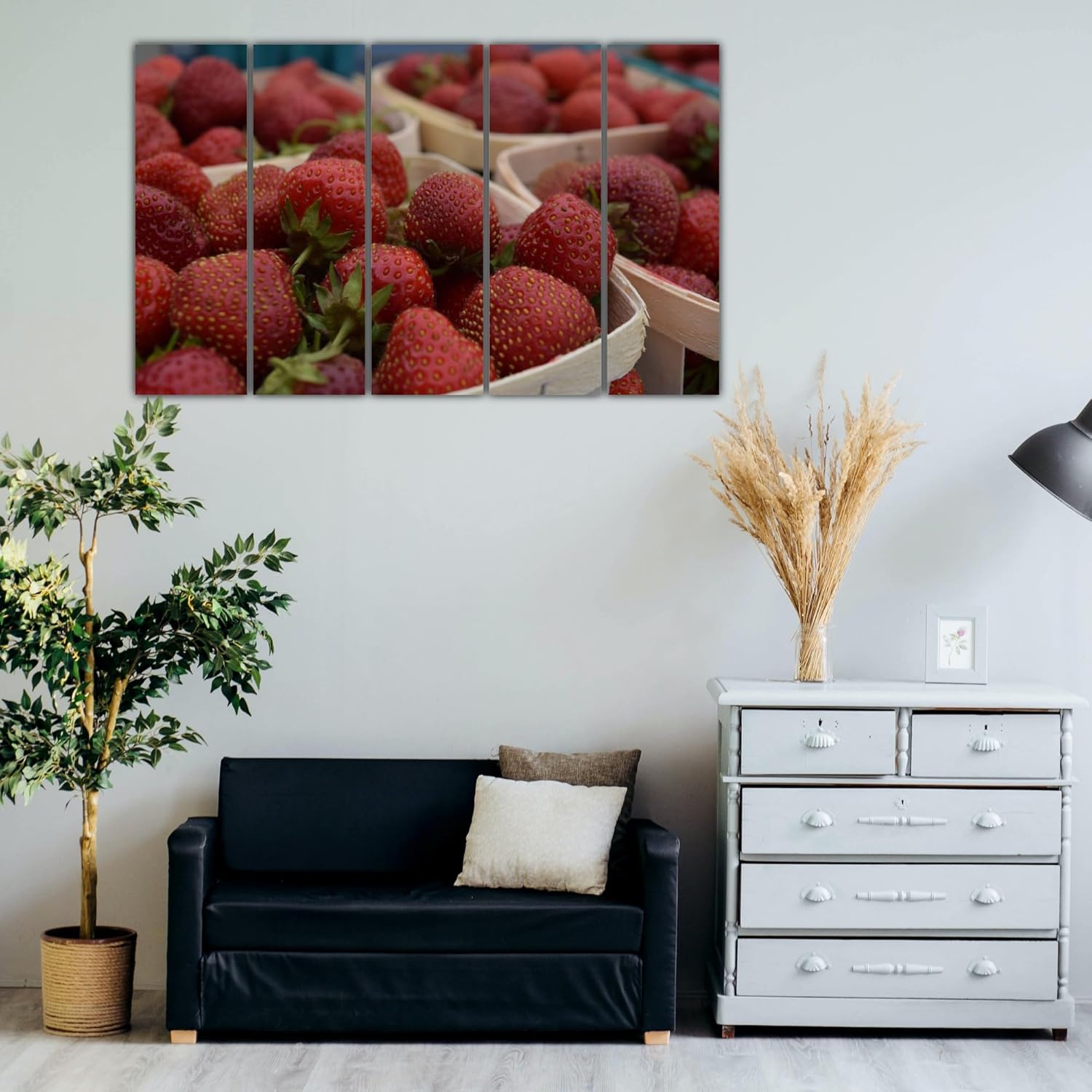Room view showcasing Berry Good Vibrations: Framed Strawberry Photography Wall Art with natural wooden frames above a sofa