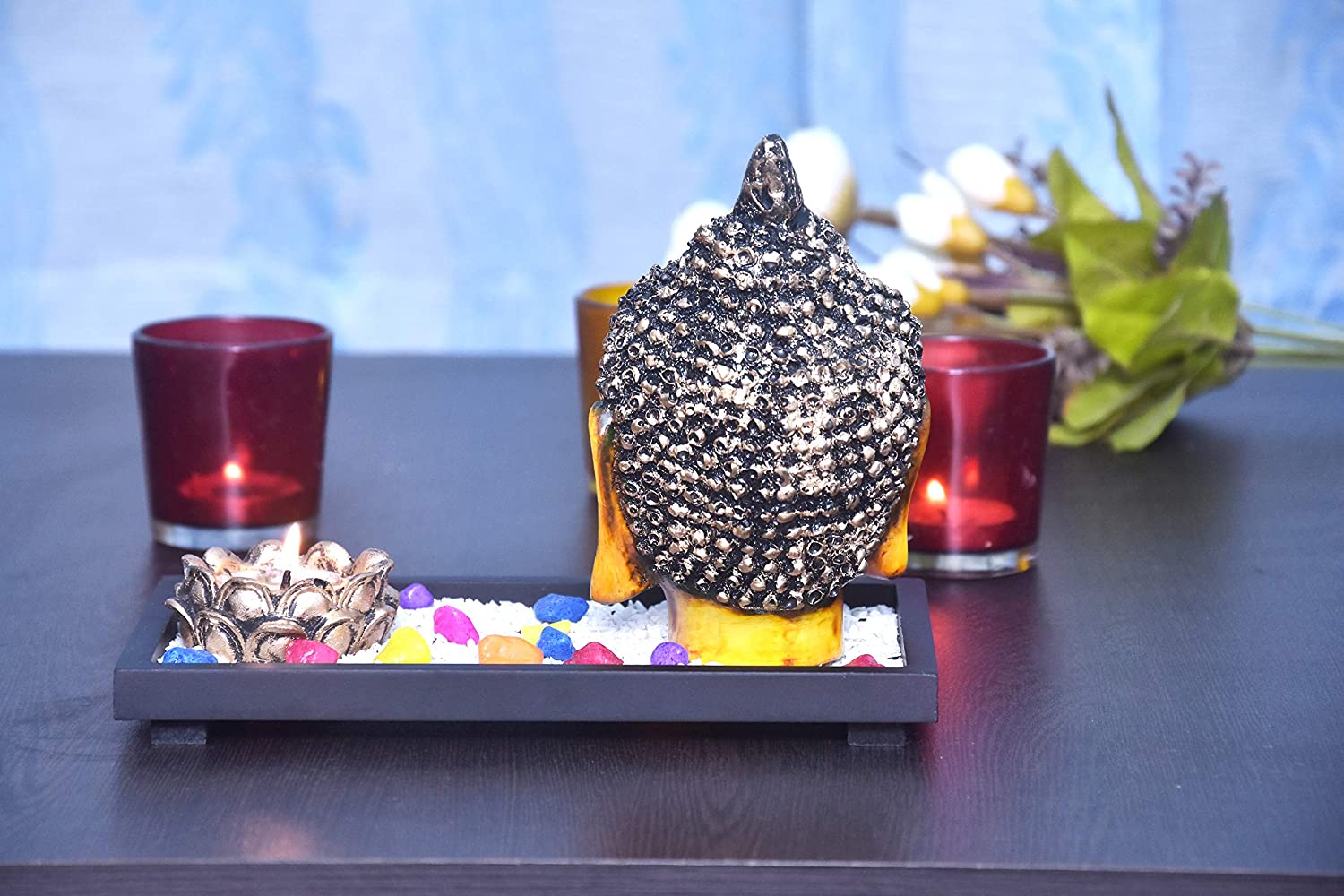 325682-top-buddha-face-showpiece-with-yellow-and-antique-silver-finish-on-wooden-tray-with-pebbles-and-tealight-holder-online.jpg