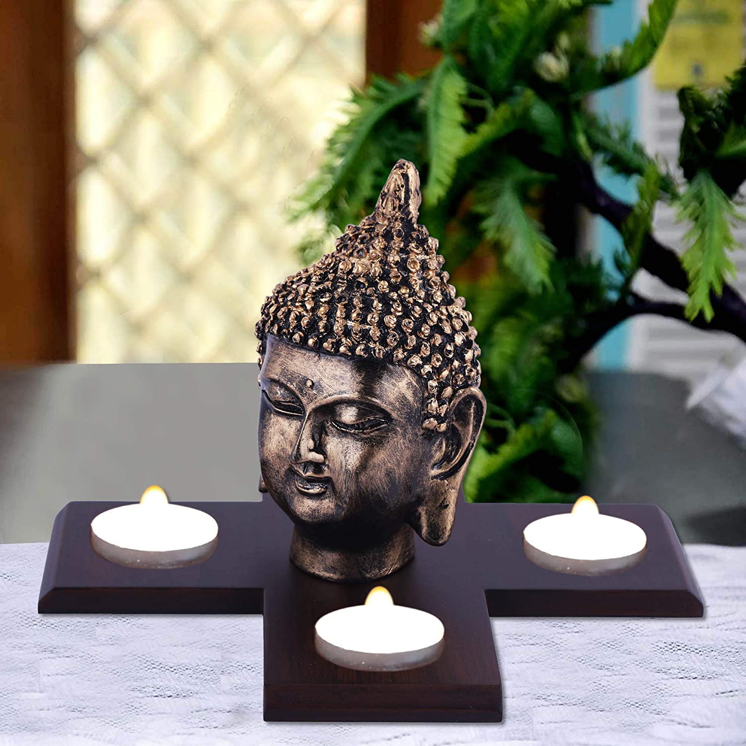 325686-top-antique-golden-buddha-face-showpiece-on-plus-shaped-wooden-tray-with-four-tealights-india.jpg