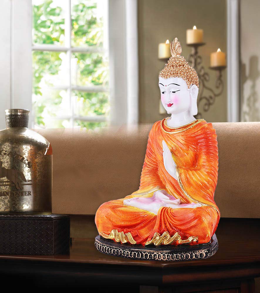 325826-top-ten-inch-white-buddha-showpiece-sitting-with-orange-robe-india.jpg