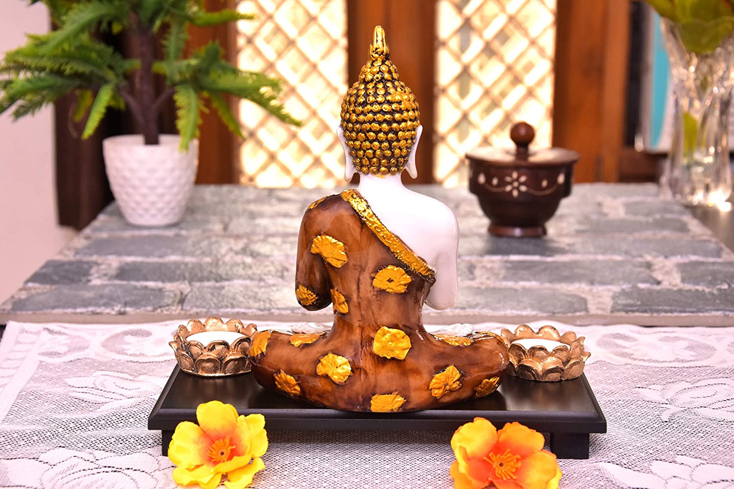 325834-top-buddha-showpiece-in-prayer-pose-sitting-on-a-wooden-platform-with-two-tealight-holders-online.jpg