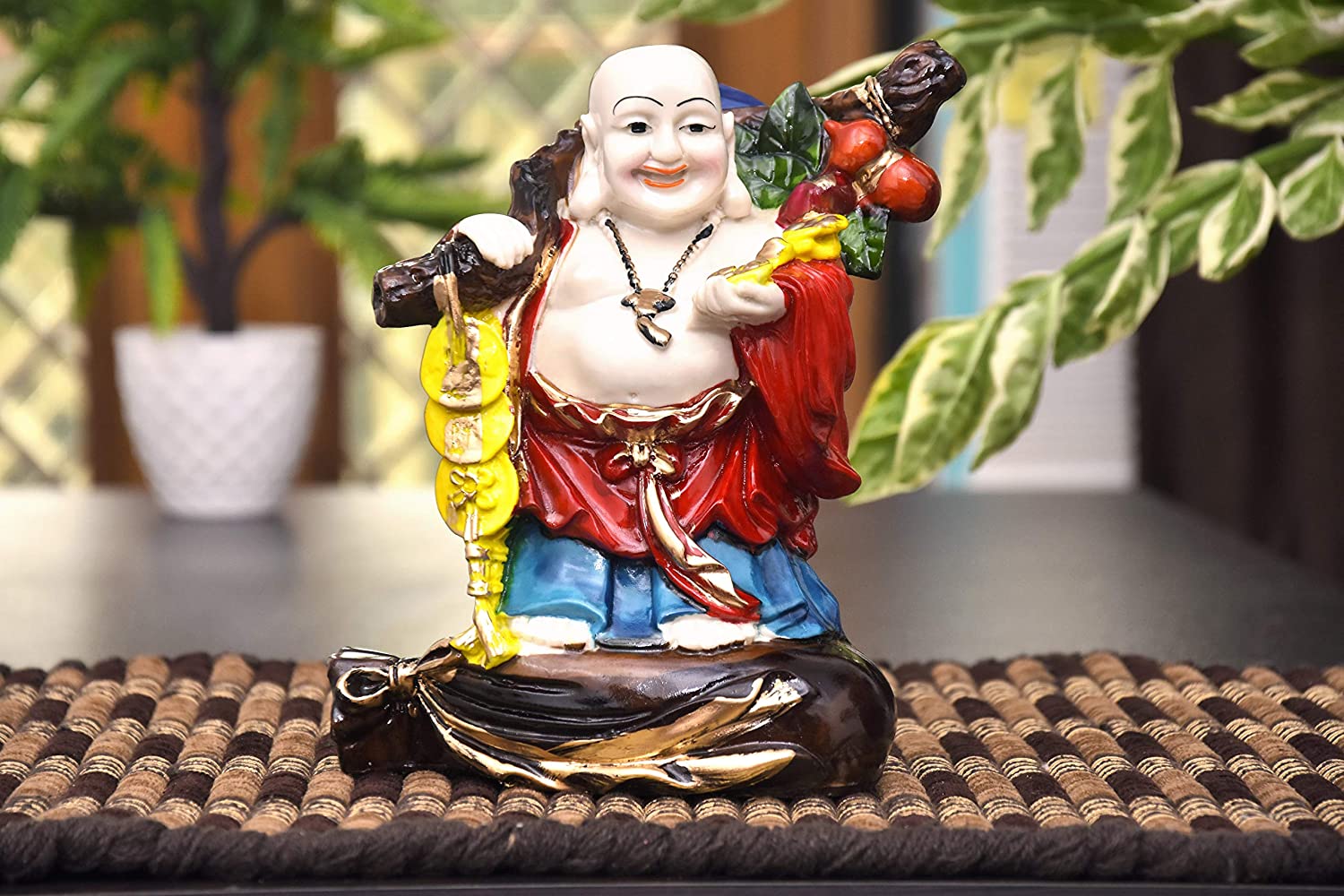 325984-top-multicolour-laughing-buddha-showpiece-carrying-a-sack-on-his-shoulders-available-online.jpg