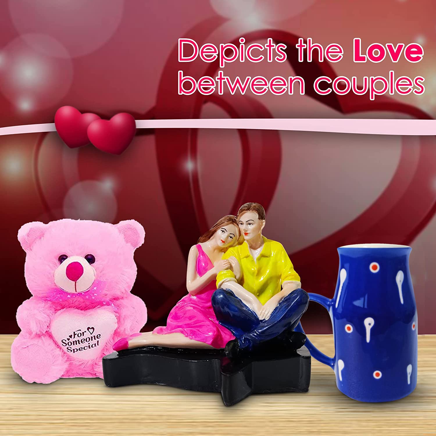 326034-best-online-couple-statue-with-blue-milk-mug-and-pink-teddy-holding-a-heart-for-anniversary-gifts.jpg