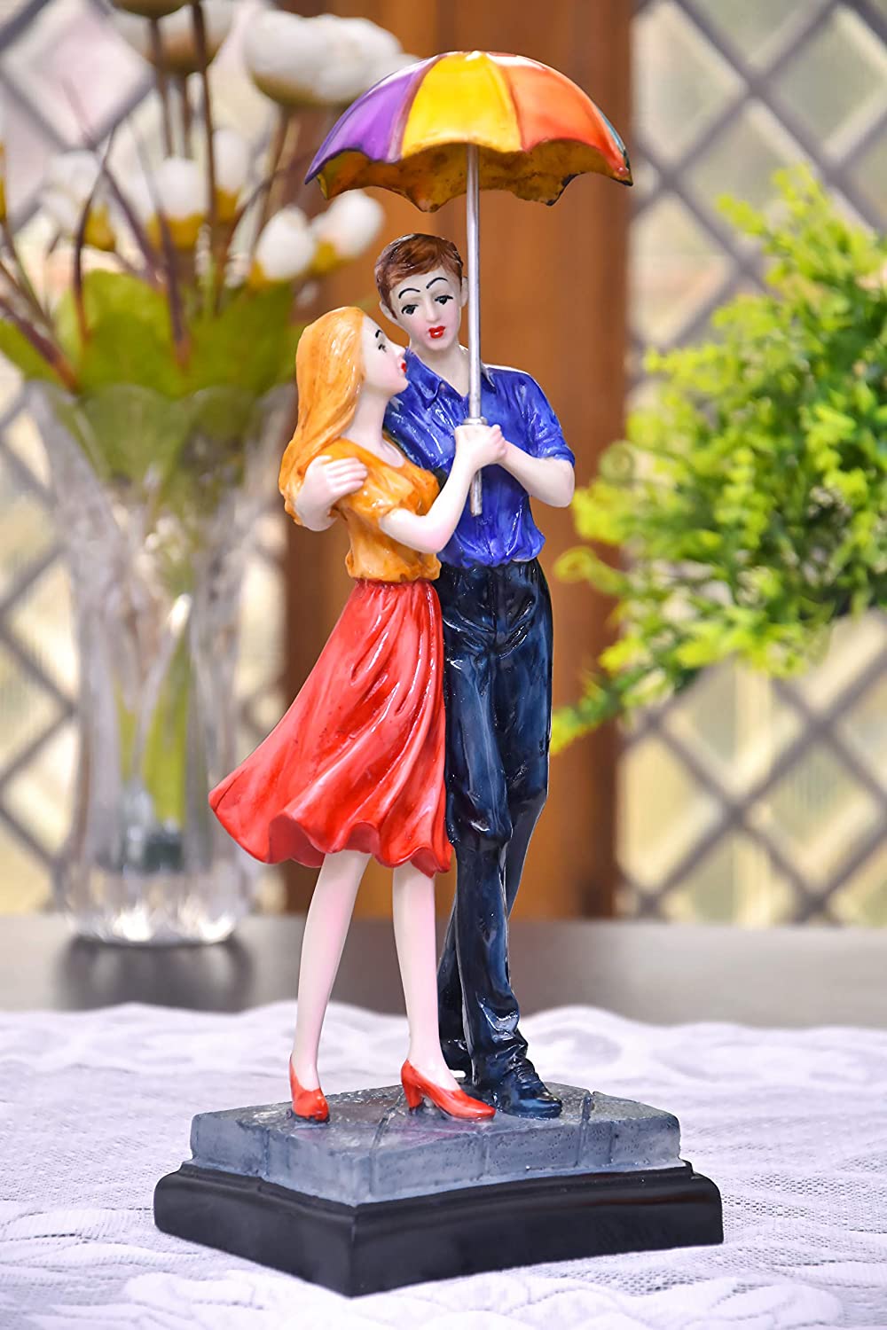326049-top-orange-and-blue-couple-statue-for-anniversary-present-online.jpg