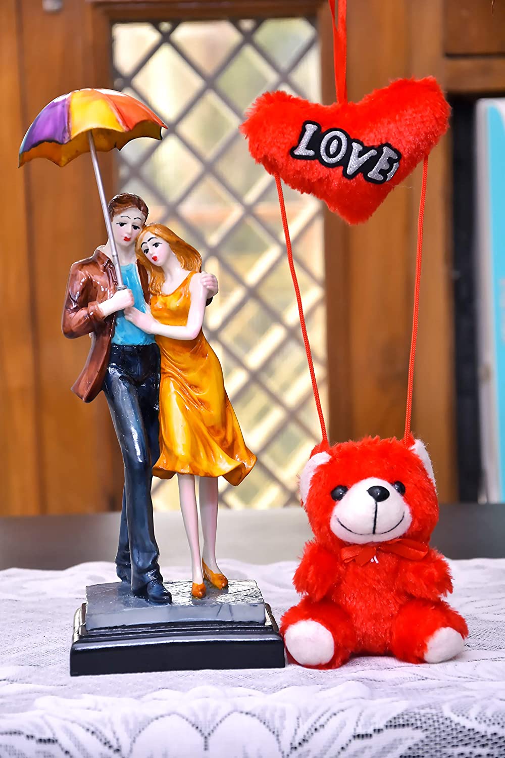326077-top-online-couple-statue-with-pink-teddy-for-birthday-gift.jpg