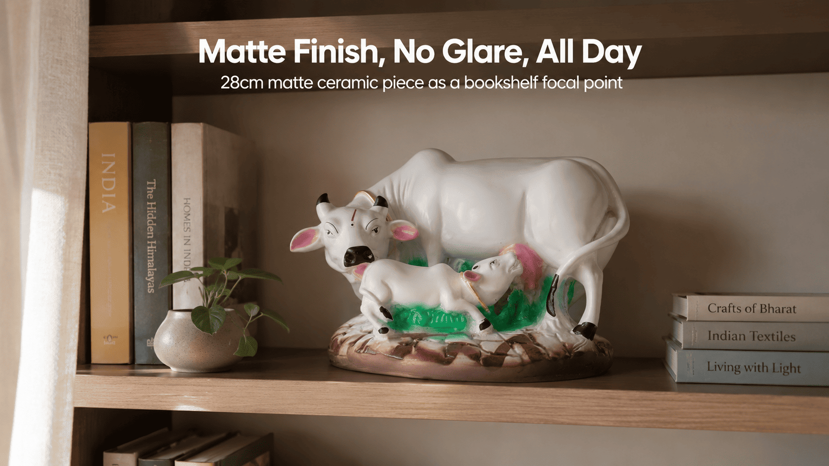 matte ceramic decorative piece on a bookshelf in natural light