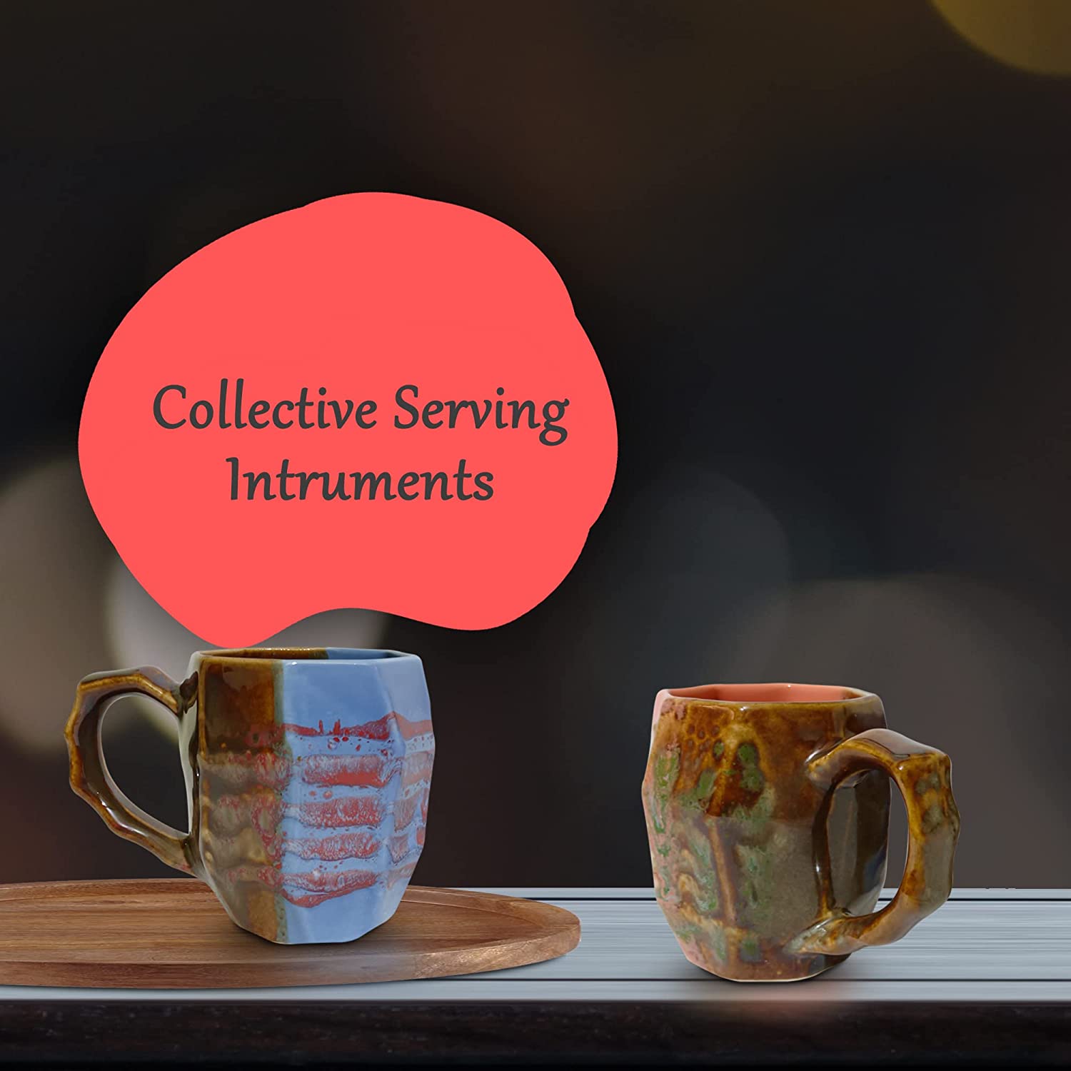 Orange and blue ceramic coffee mug set with artisanal brush strokes displayed on a kitchen counter.