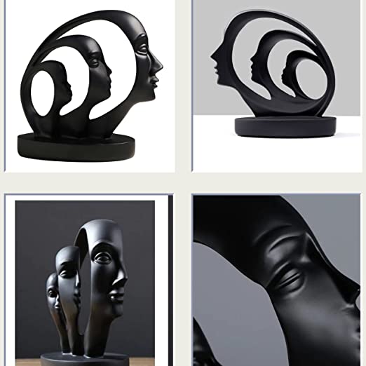 Black Human Family Statue Modern Design displayed on a kitchen island with elegant neutral-toned decor in the background.