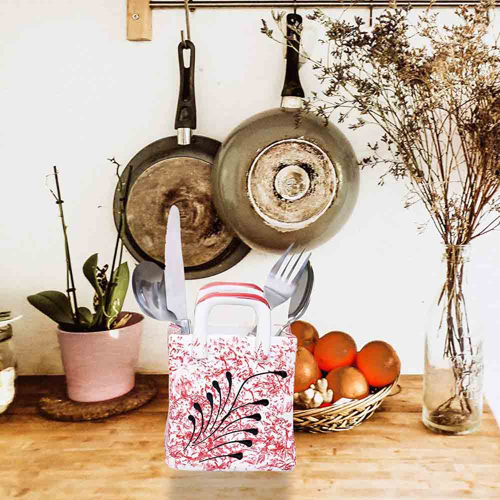 Brown and White Ceramic Cutlery Holder on Kitchen Counter.