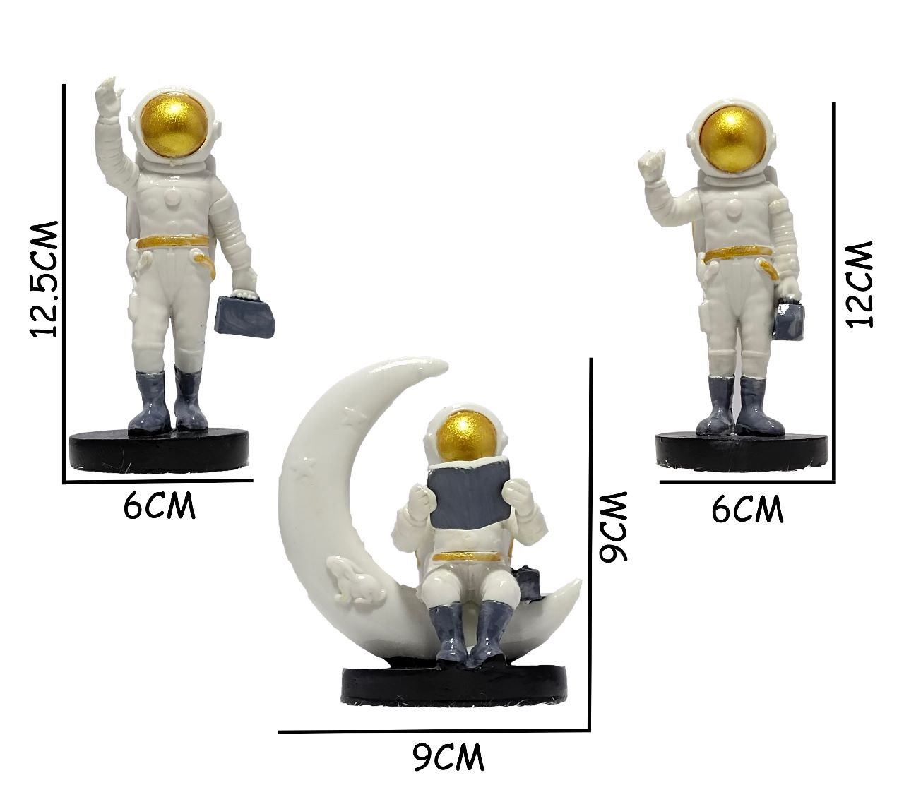 White astronaut statue sitting and reading a book on a kitchen counter.