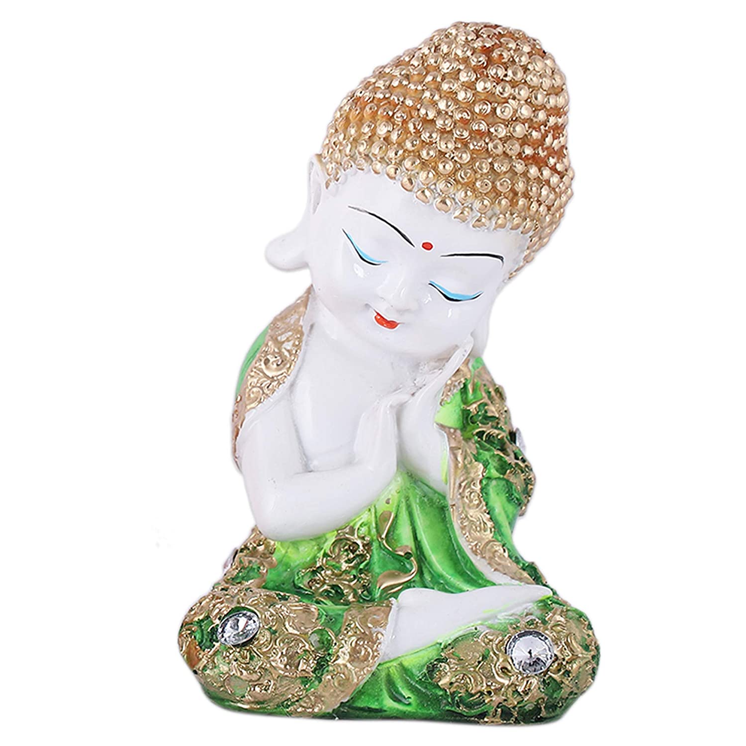 Green Baby Buddha statue in meditative pose with hands on cheeks on a kitchen countertop