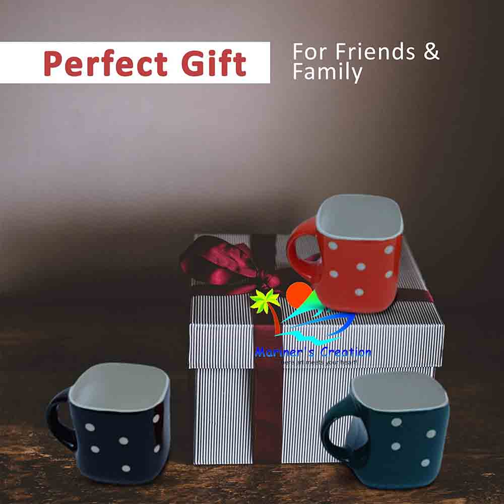 Multicolor ceramic tea cup with playful white dots and visible white interior, third in a set of six.