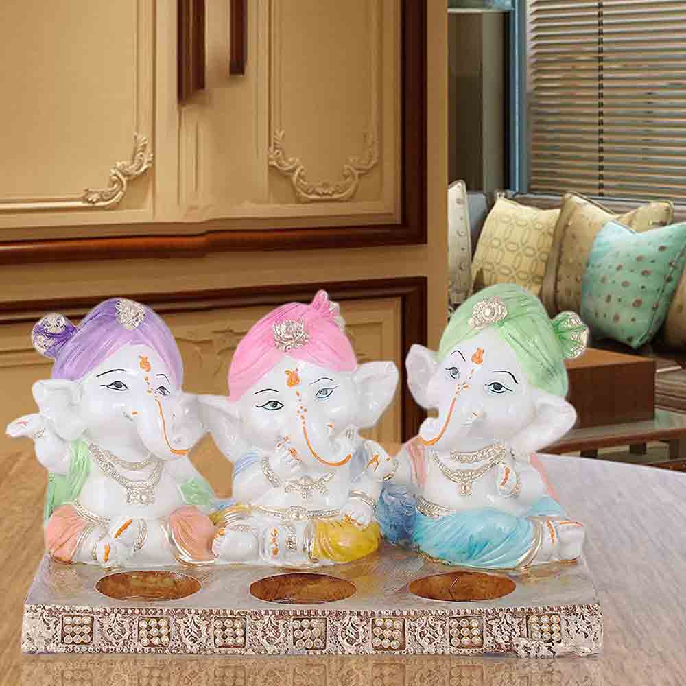 Lord Ganesha in three mudras