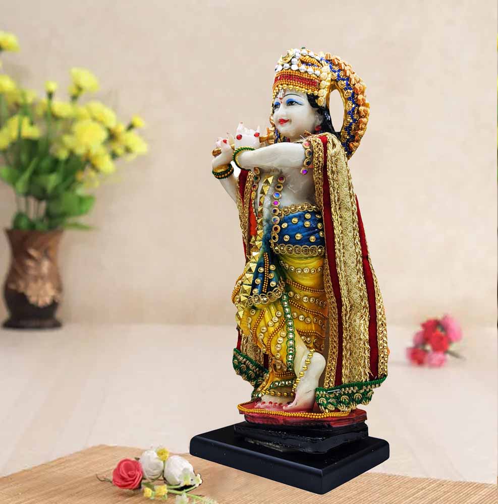 lord krishna idol with bansuri
