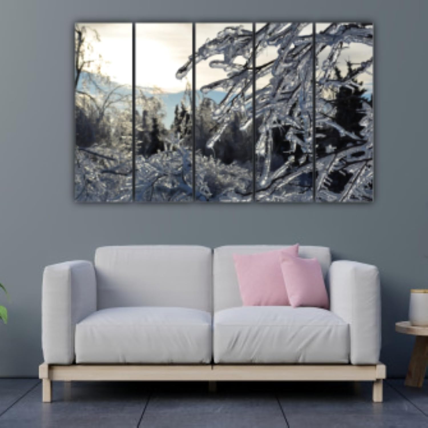5-panel Winter Wonderland Wall Art arranged on a living room wall with easy-hang hooks visible behind framed prints.