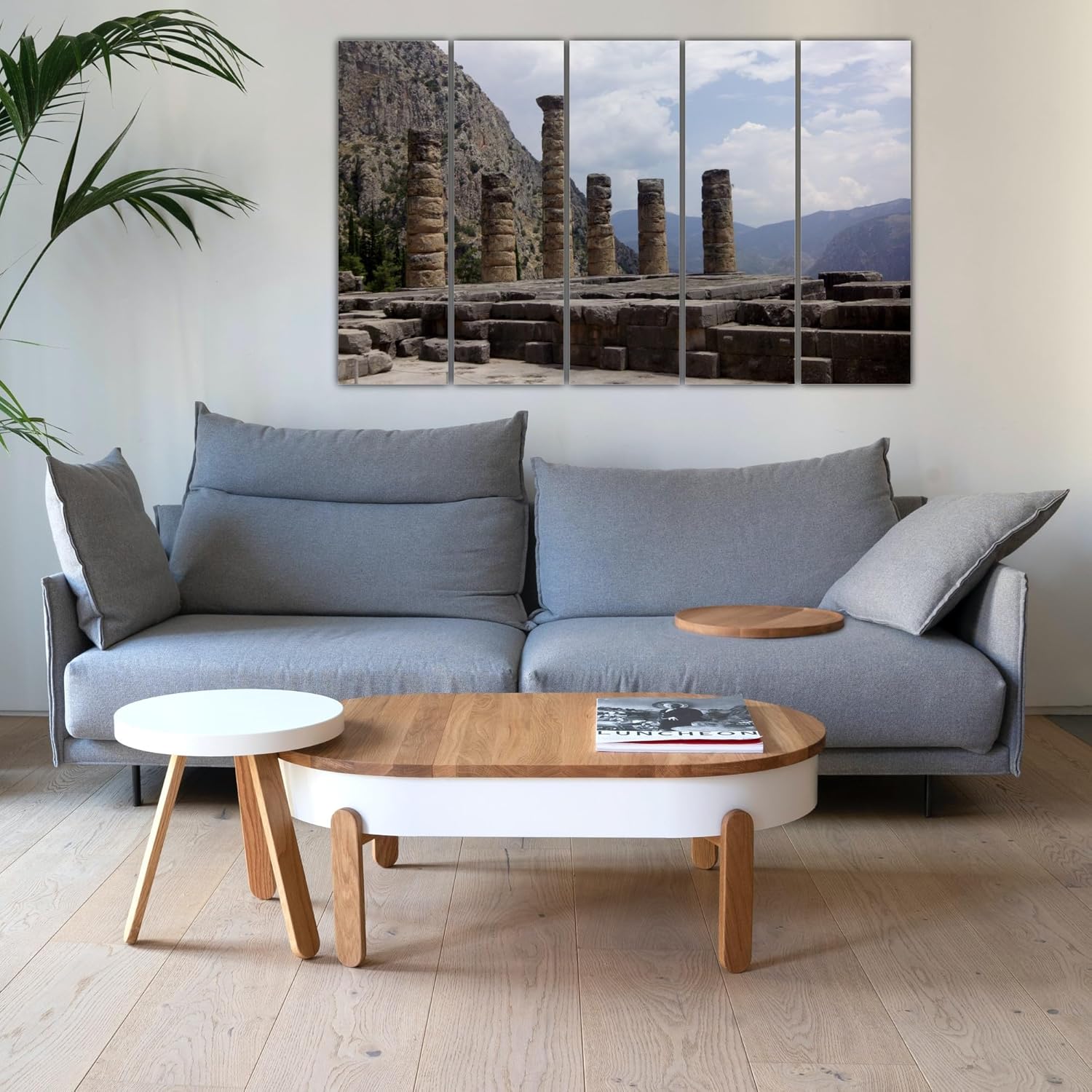 Close-up of Ruins Be Crazy Ancient Ruins Wall Art framed photography panels hung above a sofa.