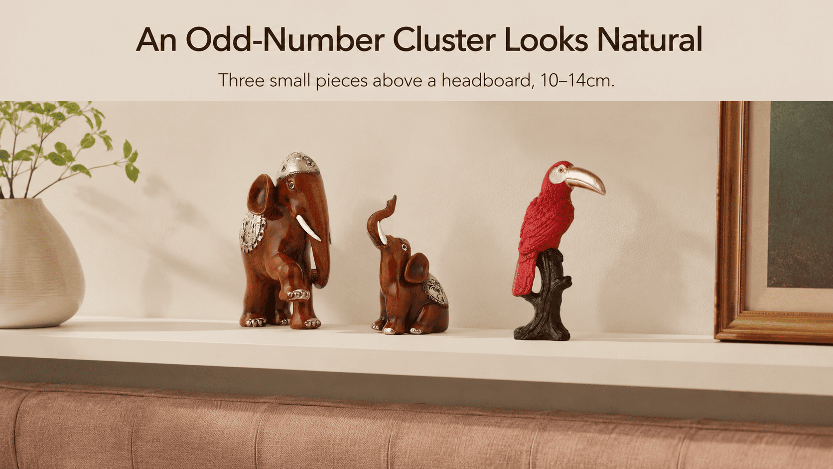 small decorative pieces clustered on a floating shelf above a headboard