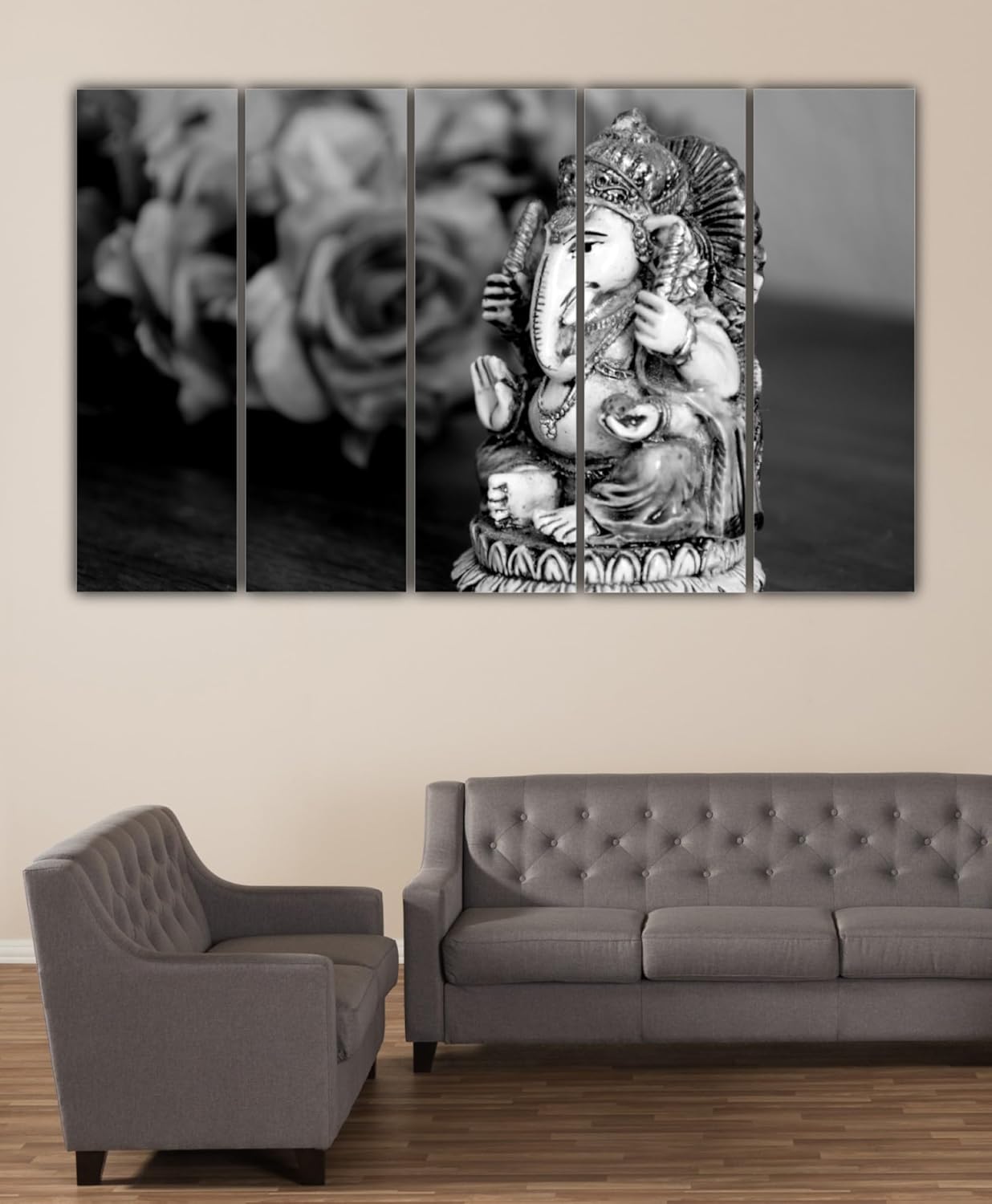 Top view of multi-frame Ganesha-tastic Wall Art installed above a sofa