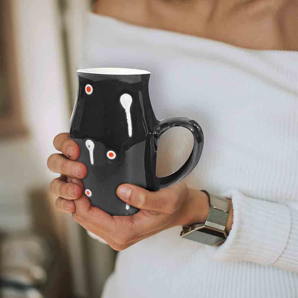 Black Coffee Mug Ceramic 500ml with hand-painted white drops design against a plain background.